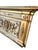 Circa 1800, the panel with an overhanging cornice ornamented with egg-and-dart carving, the primary tablet painted white...