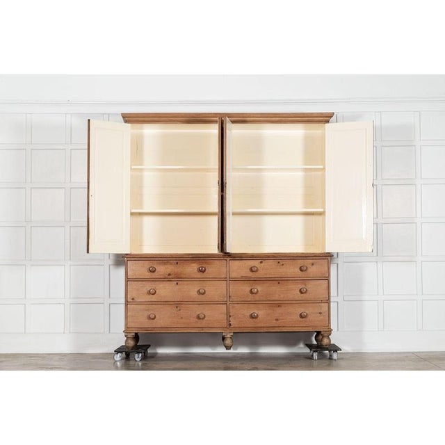 Circa 1880 large english 19thc pine housekeepers cupboard together w208 x d56 x h275 cm base w202 x d56 x h92 cm top w208...