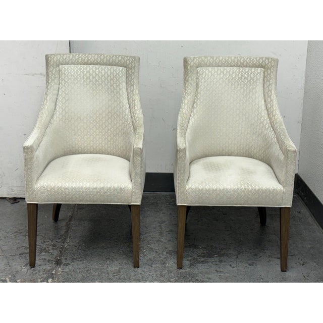 Design Plus Gallery presents a Pair of Custom Design Slope Chairs from Unknown Brand. This pair of upholstered accent...