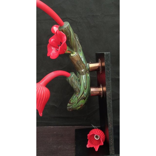 Beautiful and unique applique in hand-blown Murano glass. Base in chalcedony glass with flowers and petals made with fused...