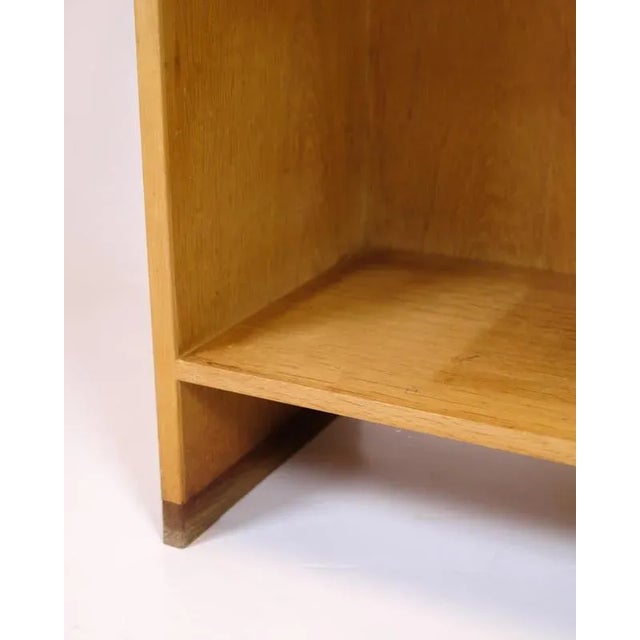 Tall oak bookcase designed by hans j. Wegner for ry møbelfabrik in the 1960s. Classic danish design with 4 shelves. —...