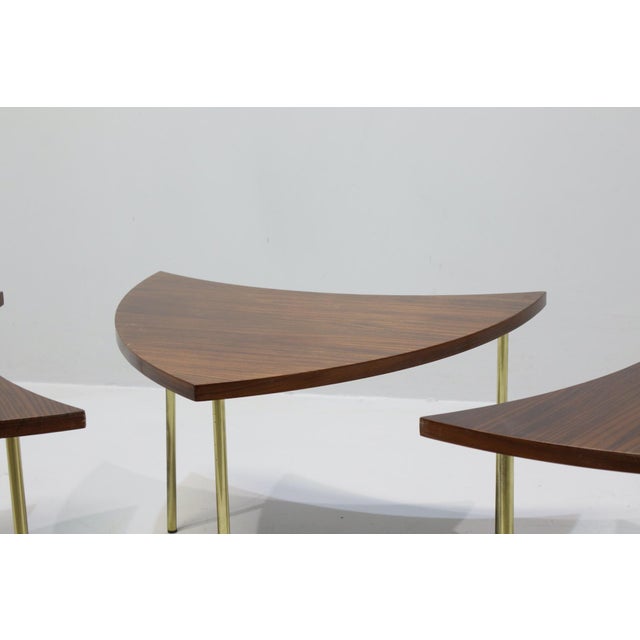 Segmented solid wood coffee table with brass legs by Peter Hvidt and Orla Mølgaard-Nielsen. The tables can be configured...