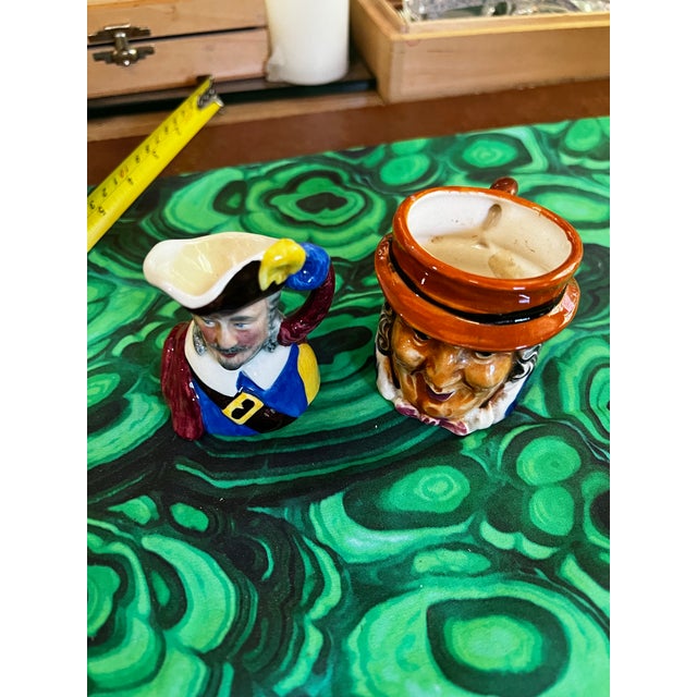 Up for consideration is a beautiful vintage pair of miniature ceramic colonial cups. These would look lovely in your home...