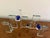 Unique 14”H x 23”W x 6”D glass menorah sculpture by creative Fay Miller. Clear glass with intense bright blue accents.