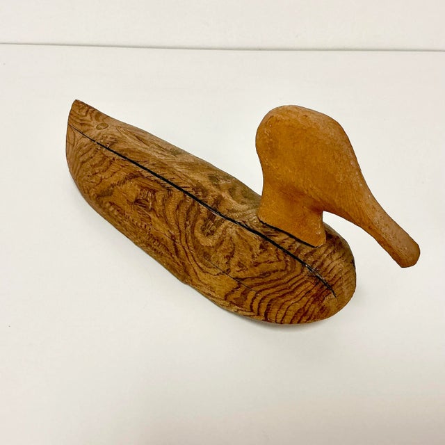 This is a wonderful Americana Folk Art Duck Decoy. From the late 1800s, its hand-carved pine with beautiful wood grain on...