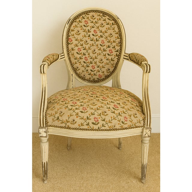 Pair of louis xvi period armchairs in cream lacquered natural wood, circa 1790. 18th century. discover this magnificent...