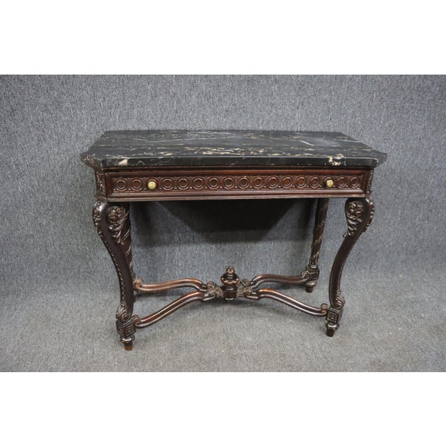 Regency Style Console Table , solid mahogany base with very detailed carvings , single drawer , black marble top with...
