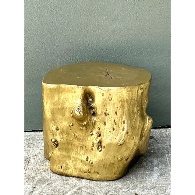 Designed with an organic, naturalistic silhouette, this vintage accent table features a sculpted tree trunk form rendered...