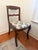 Beautiful vintage antique chairs featuring an elegant Duncan Phyfe-inspired silhouette and intricate carved rose details....