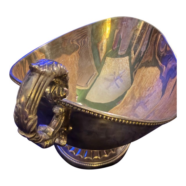 Bring timeless elegance to your dining table or sideboard with this charming antique silver-plated tureen and centerpiece...
