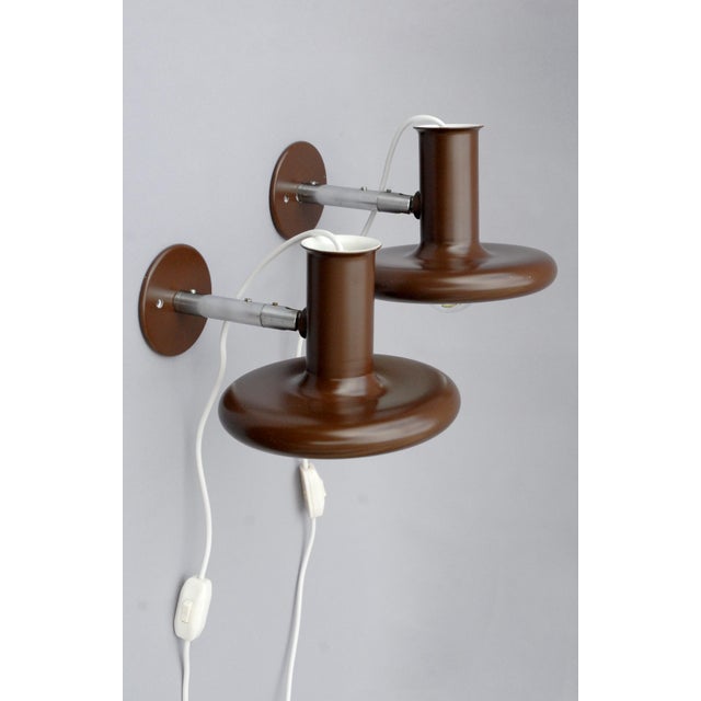 A pair of original optima 1 wall lamps, designed by hans due for fog & mørup, denmark, in the 1970s. Hans due created the...