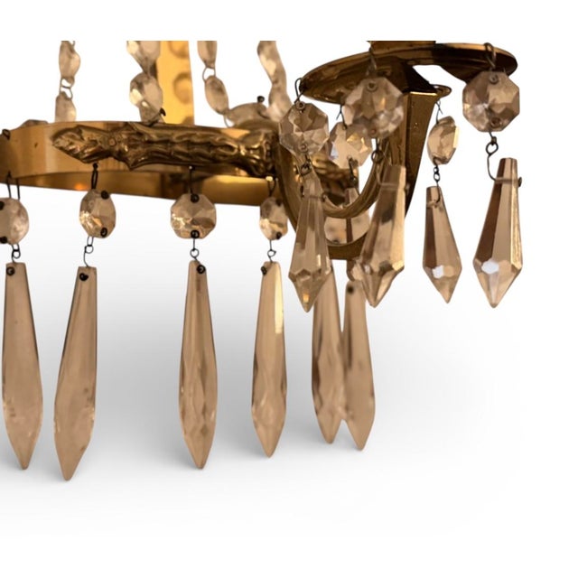 Vintage crystal wall light in brass | denmark, 1930s decorative wall light executed in brass with faceted crystal prisms,...