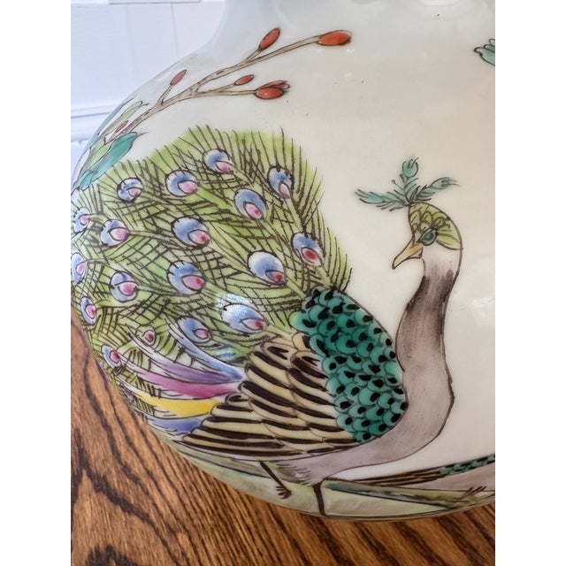 Lovely vintage Chinese porcelain vase with peacocks and flowers. Exact age unknown (from an estate).