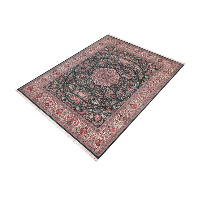 Designed with mesmerizing intricacy and gorgeous color palette, this hand-knotted masterpiece demonstrates the beauty and...