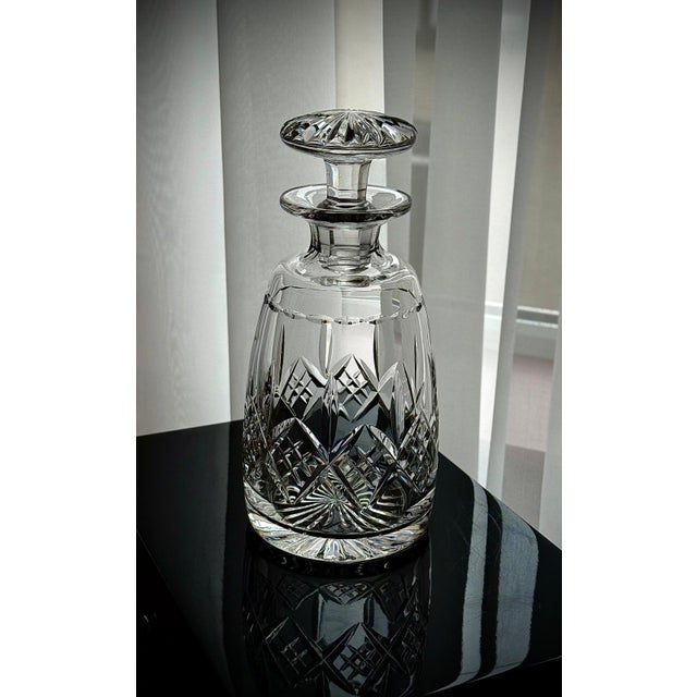 A vintage Stuart Crystal whisky decanter in the Cambridge (Glengarry) pattern, featuring a classic mallet shape and...