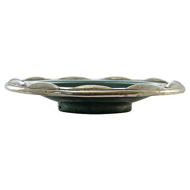 Vintage handmade Moroccan bowl in a deep emerald green glaze with the Tadelakt technique of applied hand tooled nickel...