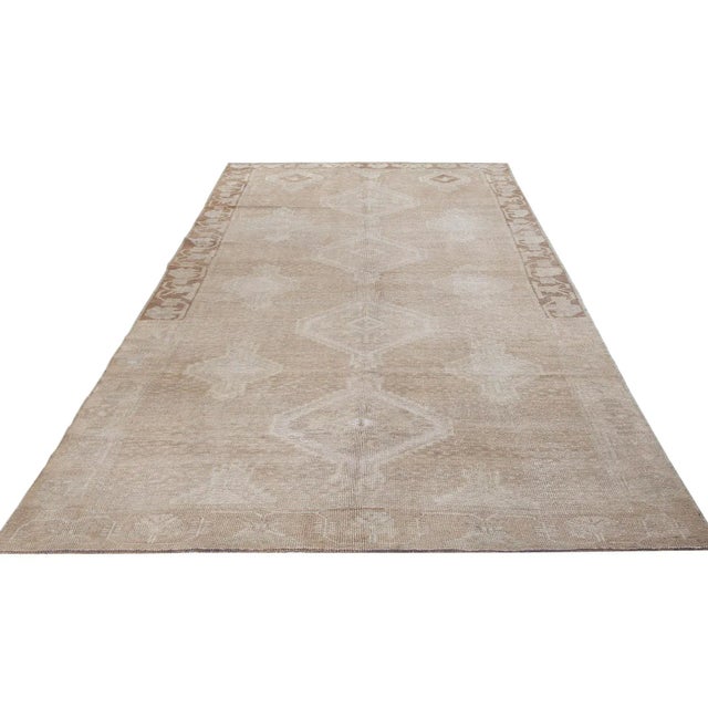 Vintage handknotted decorative wool rug from Kars region of Turkey. Approximately 50-60 years old. In very good condition.