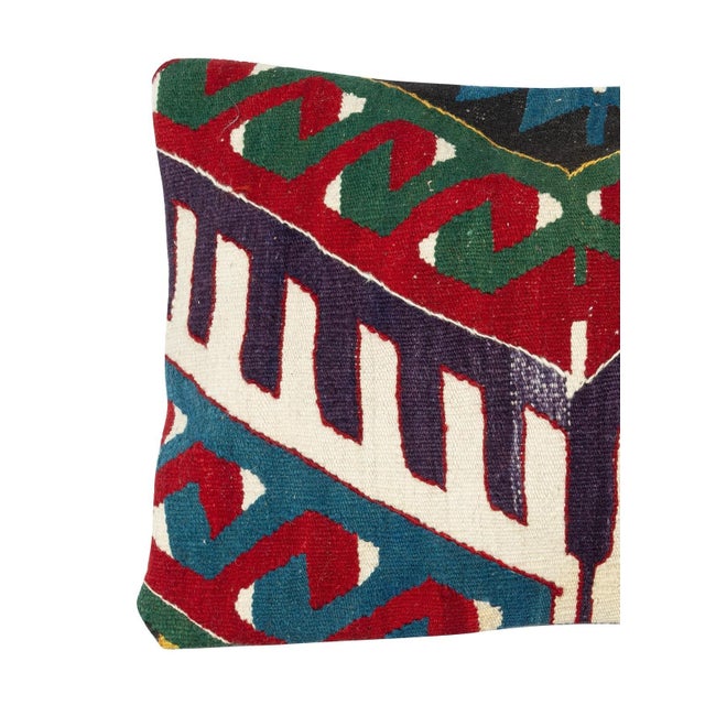 Add a touch of history and warmth to your space with this vintage handmade Turkish wool kilim cushion cover. Crafted from...