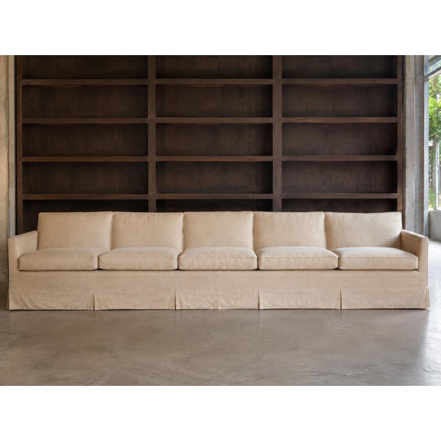 Make a statement with this exceptional 12-foot sofa, designed for large living spaces where comfort and scale matter. With...