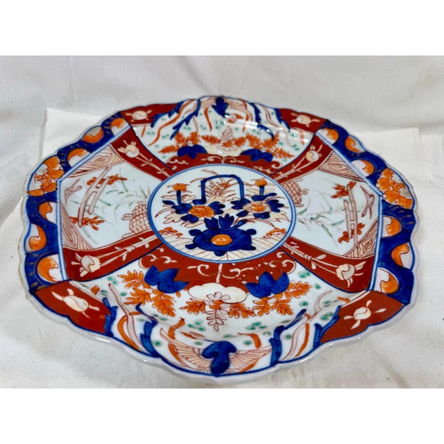 Red Large Antique Octagonal Scalloped Edge Porcelain Imari Plate Decorated With Vibrant Orange & Red Floral Patterns For Sale - Image 8 of 10