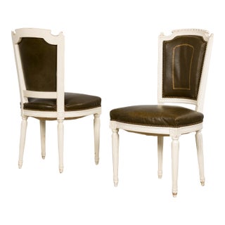 Antique French Louis XVI Style Painted Chairs With Olive Green Leather - A Pair For Sale