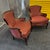 Pair of Antique Mahogany Bergere Chairs Upholstered in Burgundy and Gold Silk Details: Features a very comfortable, low...