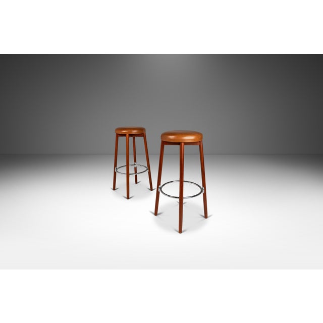 Introducing a rare set of Danish Modern barstools designed by the influential Hugo Frandsen for Spøttrup Mobler. Save for...