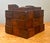 This vintage Brutalist tissue box transforms an everyday object into a bold sculptural statement, reflecting the...