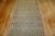 Fine quality slate blue field, red border Persian Senneh Runner. It has that repetitive Classic Herati design you see in...