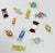 Vintage set of twelve (12) colorful Murano style blown glass wrap candies in a rich variety of shapes and colors. Age...