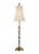 Emmett lamp features a traditional candlestick design. Crafted of antique brass and black composite, this 33" table lamp...