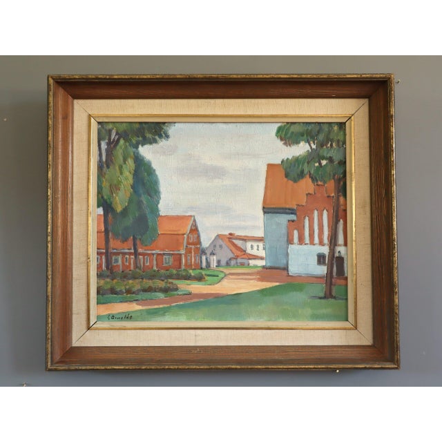 RED ROOFS Size: 17.7 x 20.9 inches (including frame) Oil on board A mid century modernist village street scene, painted in...