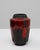 20th Century German ceramic vase. This bold West German vase exemplifies the Fat Lava style with its rich, volcanic...