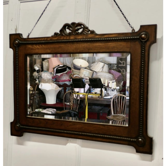 Art Deco Rectangular Oak Mirror The mirror Frame is 3” deep, it is rectangular in shape with a button carved edge and...