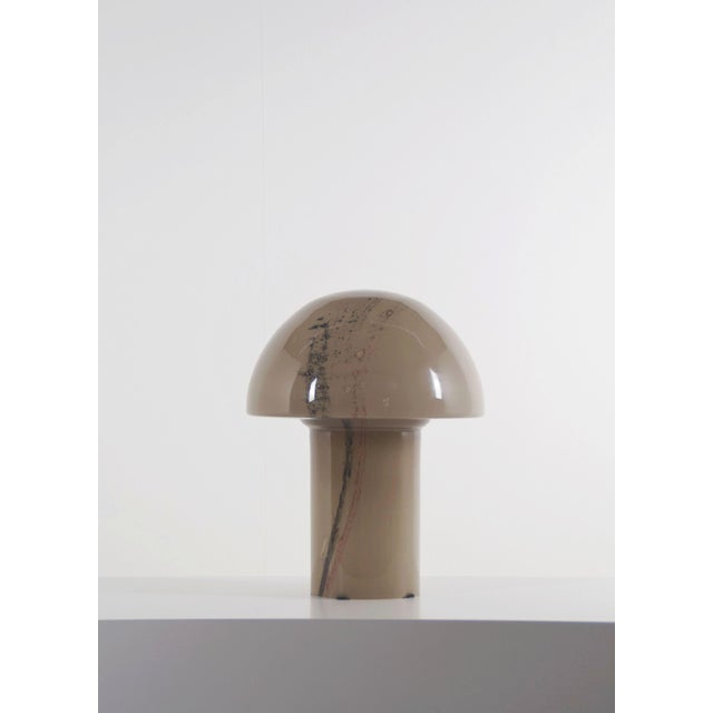 Vintage Lido table lamp in hand-blown glass (height 41 cm) designed in the early 1980s. This lamp was manufactured by...