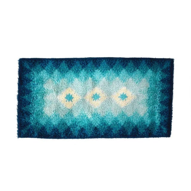 Amazing mid-century blue and white pure virgin wool rug. This wonderful carpet was produced by Samit Borgosesia in Italy...