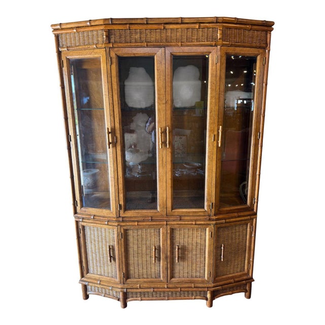 Beautiful mid-century dining set with table, china cabinet and six chairs. The table has a glass protected top with woven...