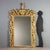 Large Baroque-style mirror, crafted in Italy in the 19th century, featuring an imposing structure in carved and gilded...