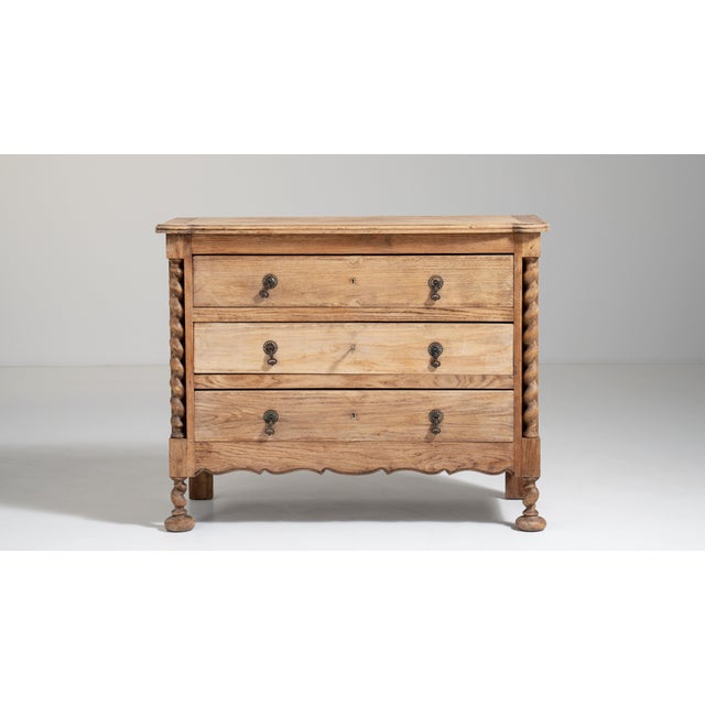 A characterful chest combining oak and pine construction, reflecting practical furniture-making methods of the time. The...