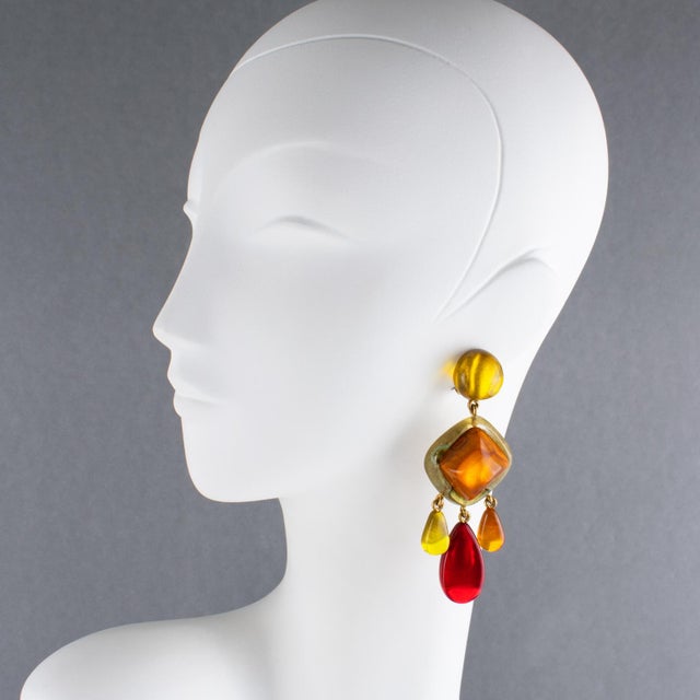 These stunning, oversized clip-on earrings by Dominique Denaive Paris feature a sculptural, chandelier-like dangling...