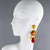 These stunning, oversized clip-on earrings by Dominique Denaive Paris feature a sculptural, chandelier-like dangling...