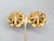 1980s matte goldtone round spiral with pointed center clip earrings. Marked "V©" on the back of one earring, a mark seen...
