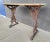 Uncommon rectangular form cast iron pub table. Circa. early 1900's. Highly detailed casting with original painted wood...