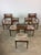 This set of five mid century modern dining chairs feature hardwood construction, original walnut finish, caned seat back...