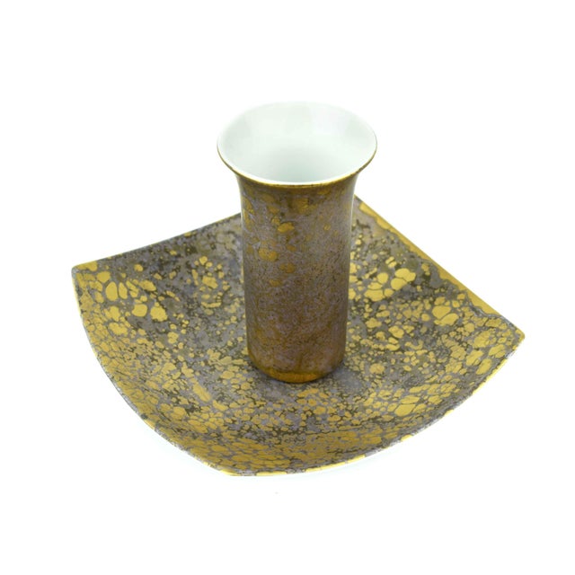 This elegant mid-20th century Rosenthal Studio Linie set includes a small vase and a matching plate, both distinguished by...