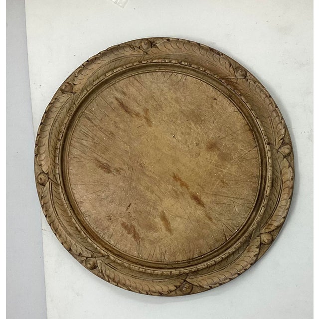 19th C deeply carved bread board. Usually made of beech or sycamore wood. The board has been well used but is in great...