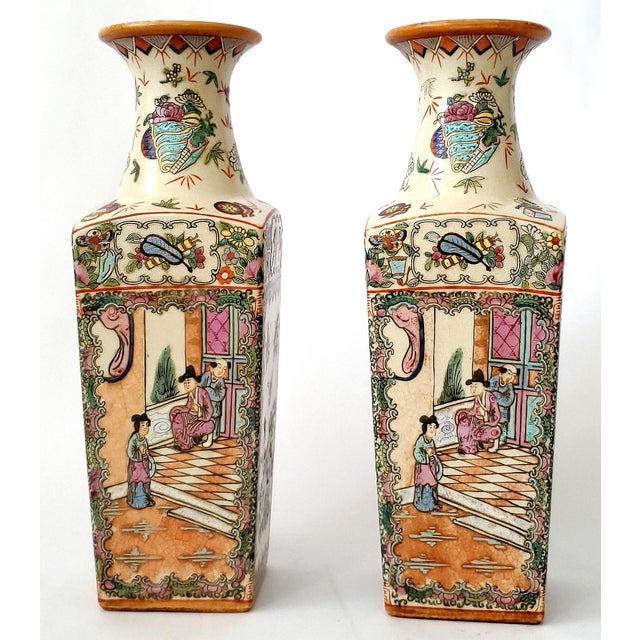 Offering a pair of antique Canton Famille Rose Medallion large vases in the style of the Qing Dynasty, circa Early to Mid...