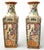 Offering a pair of antique Canton Famille Rose Medallion large vases in the style of the Qing Dynasty, circa Early to Mid...