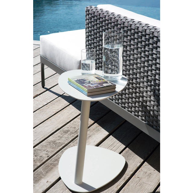Such a smart table indeed! Practical yet stylish, this contemporary outdoor aluminum side table is a great companion to...