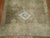 A Turkish Kars runner with a large scale geometric tribal medallion design throughout. There is some faded pink tones on 1...